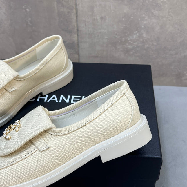 CHANEL 26S LOAFERS IN IVORY WHITE CANVAS WITH QUILTED FLAP & CHAIN CC LOGO