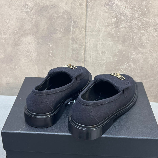 CHANEL 26S LOAFERS IN BLACK CANVAS WITH QUILTED FLAP & CHAIN CC LOGO