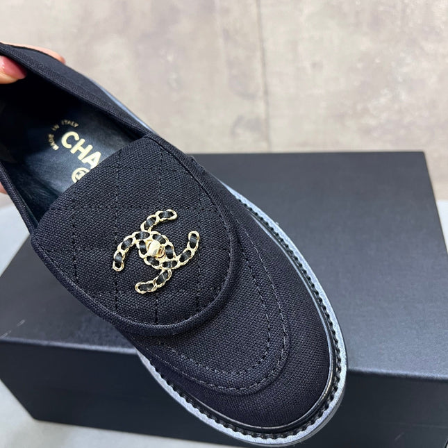 CHANEL 26S LOAFERS IN BLACK CANVAS WITH QUILTED FLAP & CHAIN CC LOGO