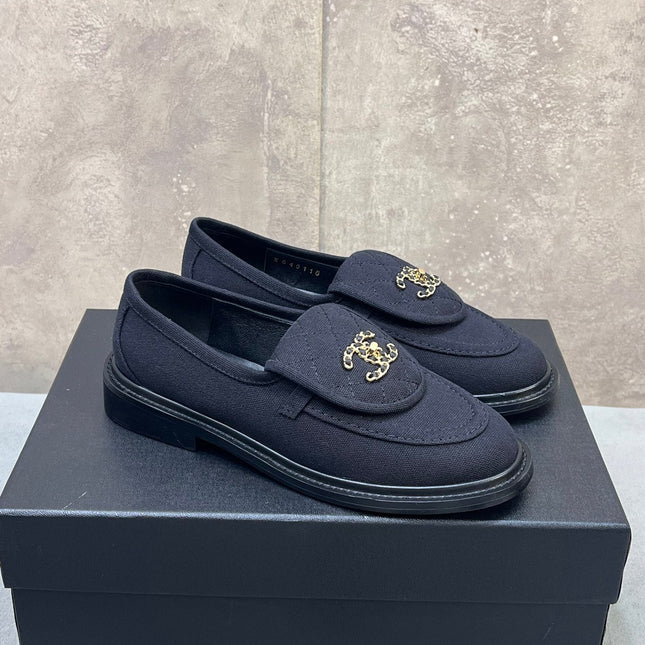 CHANEL 26S LOAFERS IN BLACK CANVAS WITH QUILTED FLAP & CHAIN CC LOGO