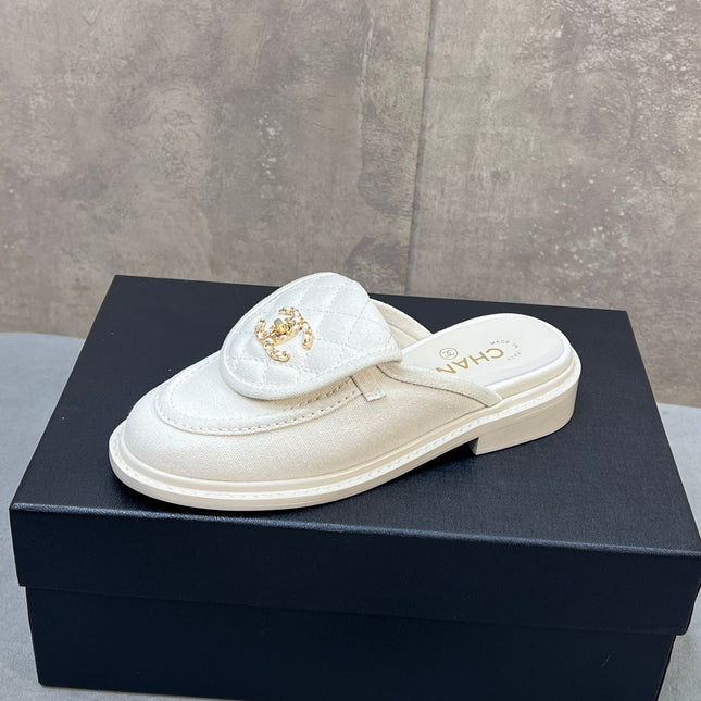 CHANEL 26S MULE LOAFERS IN WHITE CANVAS WITH QUILTED FLAP & CC LOGO