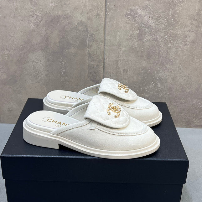 CHANEL 26S MULE LOAFERS IN WHITE CANVAS WITH QUILTED FLAP & CC LOGO