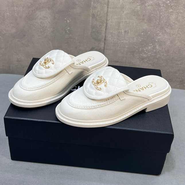 CHANEL 26S MULE LOAFERS IN WHITE CANVAS WITH QUILTED FLAP & CC LOGO