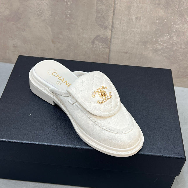 CHANEL 26S MULE LOAFERS IN WHITE CANVAS WITH QUILTED FLAP & CC LOGO