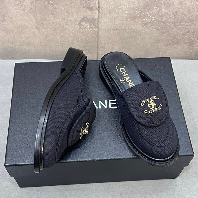 CHANEL 26S MULE LOAFERS IN BLACK CANVAS WITH QUILTED FLAP & CHAIN CC LOGO