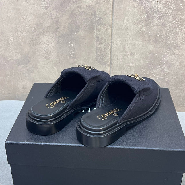 CHANEL 26S MULE LOAFERS IN BLACK CANVAS WITH QUILTED FLAP & CHAIN CC LOGO