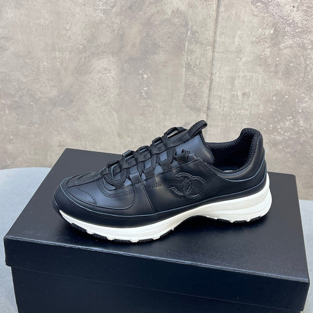 CHANEL 26S RUNNER CC LOGO SNEAKERS IN BLACK CALFSKIN