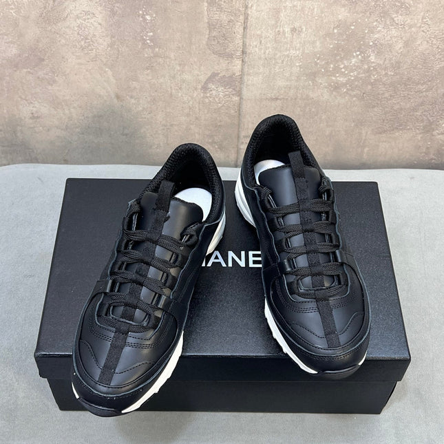 CHANEL 26S RUNNER CC LOGO SNEAKERS IN BLACK CALFSKIN