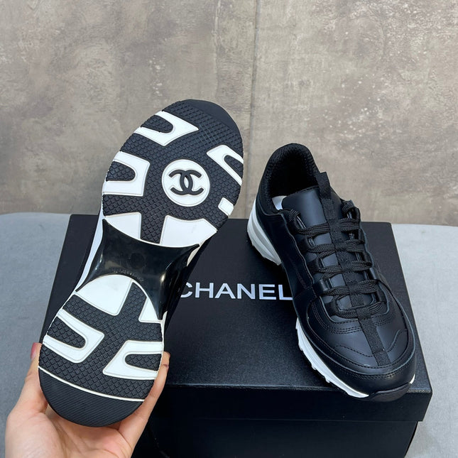 CHANEL 26S RUNNER CC LOGO SNEAKERS IN BLACK CALFSKIN