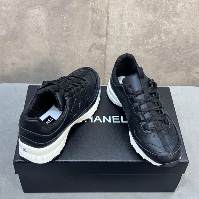 CHANEL 26S RUNNER CC LOGO SNEAKERS IN BLACK CALFSKIN