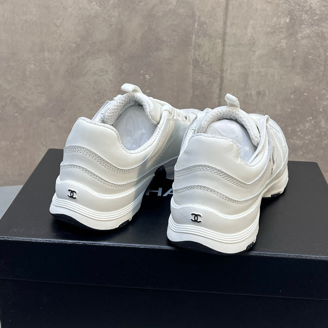 CHANEL 26S RUNNER CC LOGO SNEAKERS IN WHITE CALFSKIN