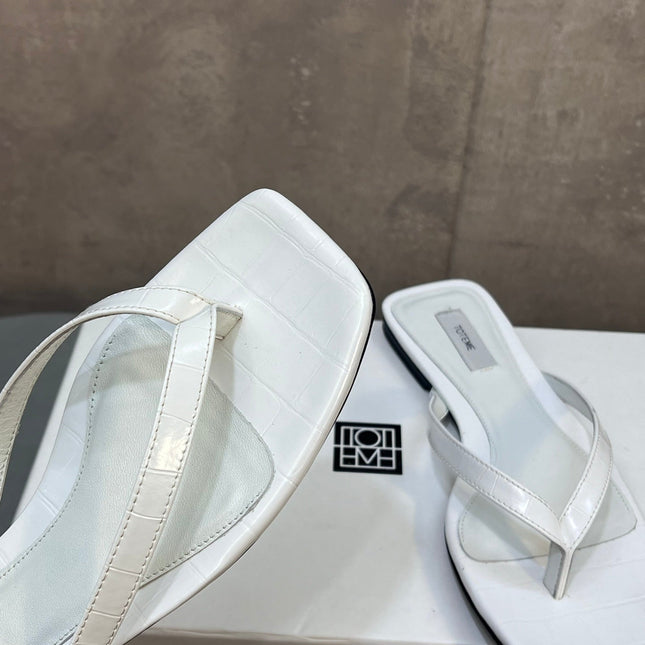 THE ROW 26S SQUARE TOE THONG SANDALS IN WHITE CROCODILE EMBOSSED CALFSKIN