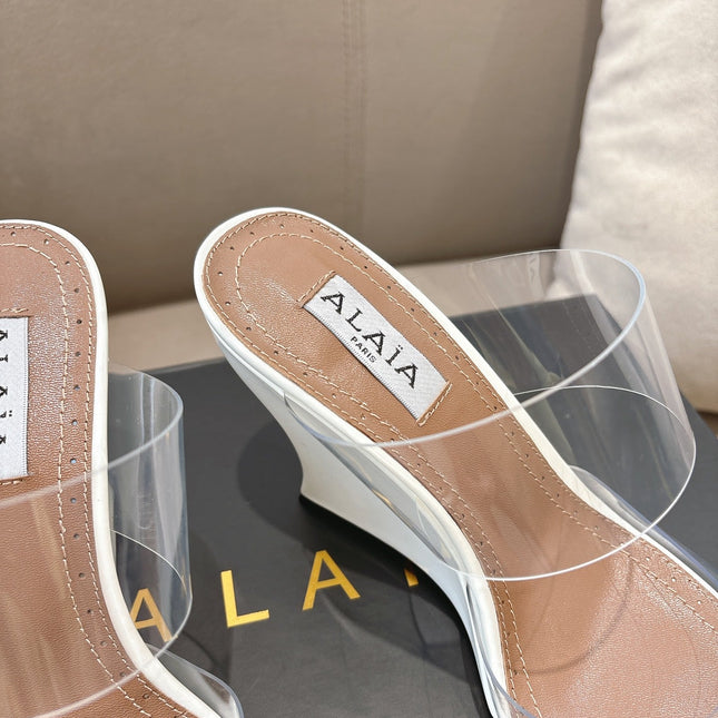 ALAIA 26S HIGH-HEEL WEDGE MULES 95 MM IN WHITE GLOSSY CALFSKIN
