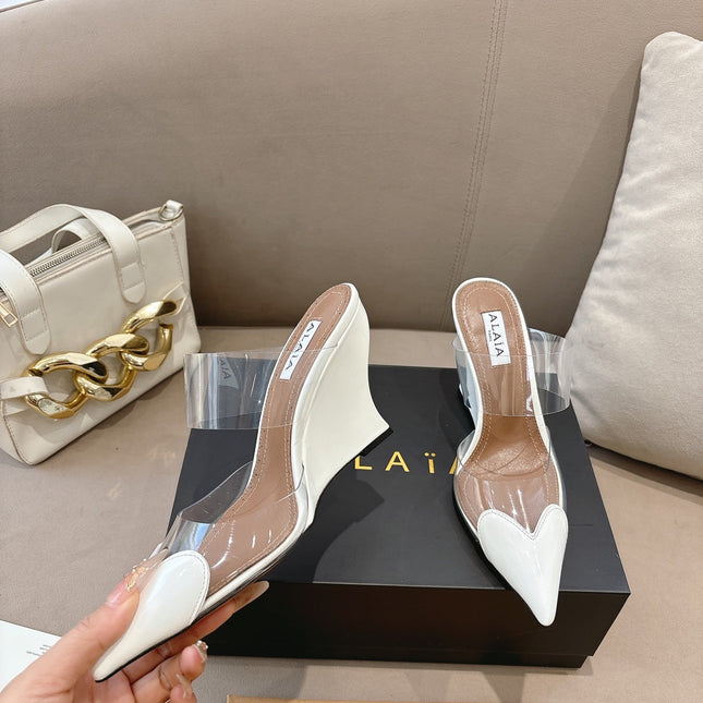 ALAIA 26S HIGH-HEEL WEDGE MULES 95 MM IN WHITE GLOSSY CALFSKIN