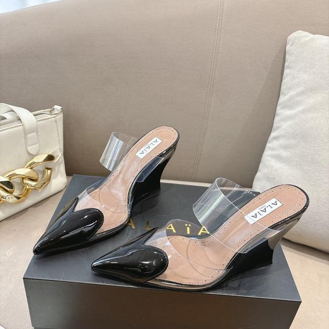 ALAIA 26S HIGH-HEEL WEDGE MULES 95 MM IN BLACK GLOSSY CALFSKIN