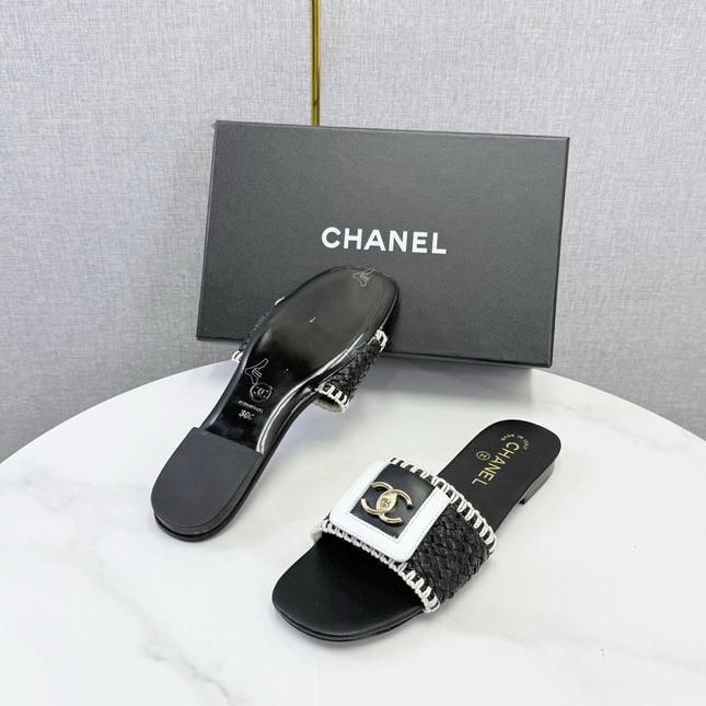 CHANEL 26S WOVEN STRAP SLIDES IN BLACK LAMBSKIN