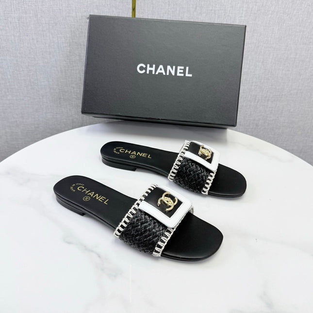 CHANEL 26S WOVEN STRAP SLIDES IN BLACK LAMBSKIN