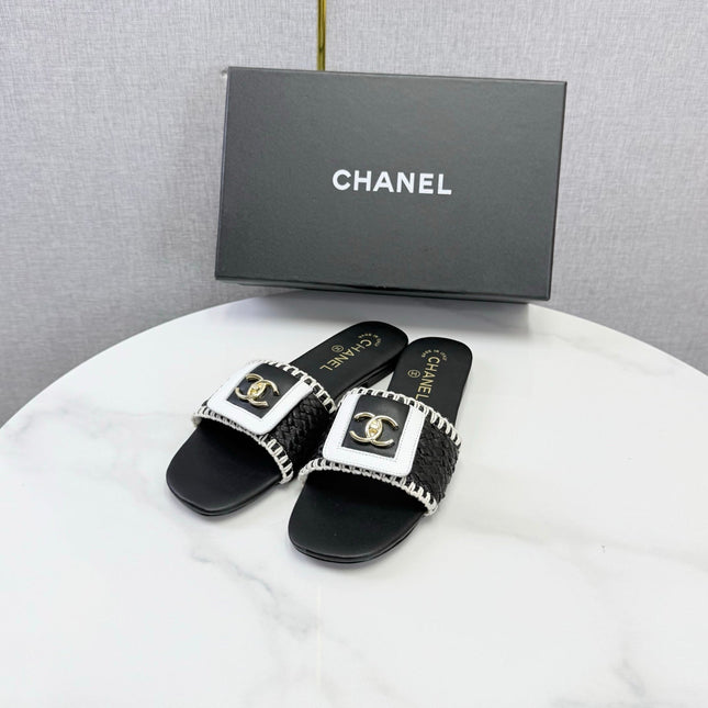CHANEL 26S WOVEN STRAP SLIDES IN BLACK LAMBSKIN