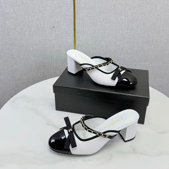 CHANEL 26S HIGH HEEL MULES 45 MM IN WHITE AND BLACK LAMBSKIN