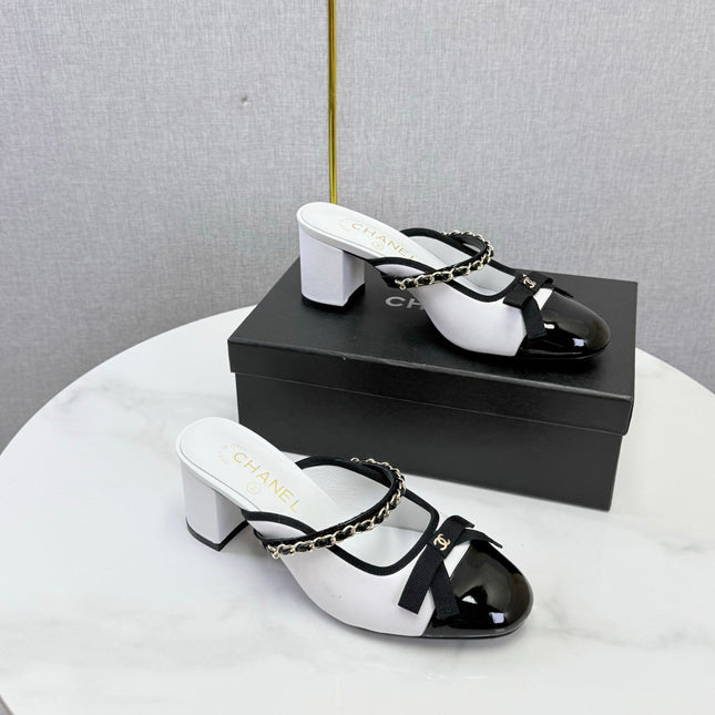 CHANEL 26S HIGH HEEL MULES 45 MM IN WHITE AND BLACK LAMBSKIN
