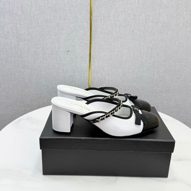 CHANEL 26S HIGH HEEL MULES 45 MM IN WHITE AND BLACK LAMBSKIN