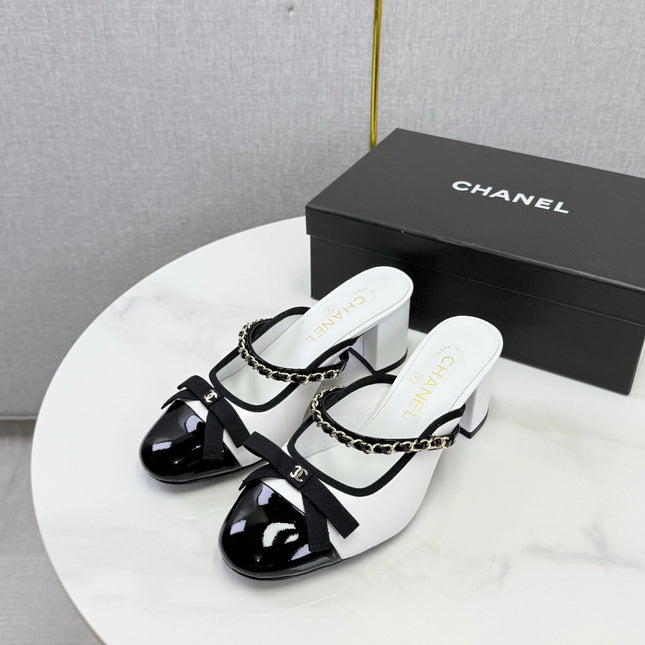 CHANEL 26S HIGH HEEL MULES 45 MM IN WHITE AND BLACK LAMBSKIN