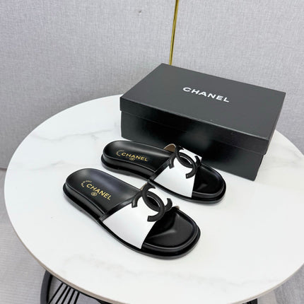 CHANEL 26S ICONIC CC SLIDES IN WHITE LAMBSKIN