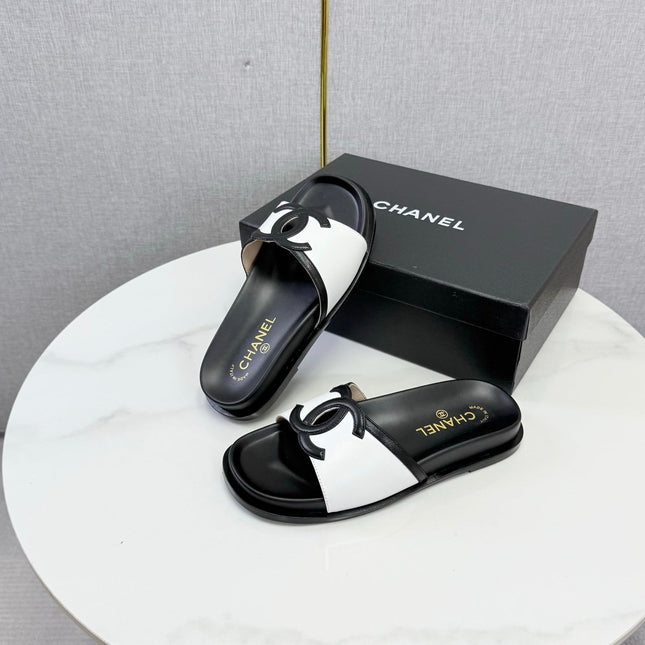 CHANEL 26S ICONIC CC SLIDES IN WHITE LAMBSKIN