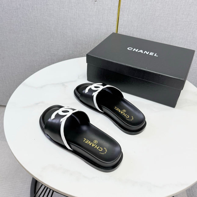CHANEL 26S ICONIC CC SLIDES IN BLACK LAMBSKIN