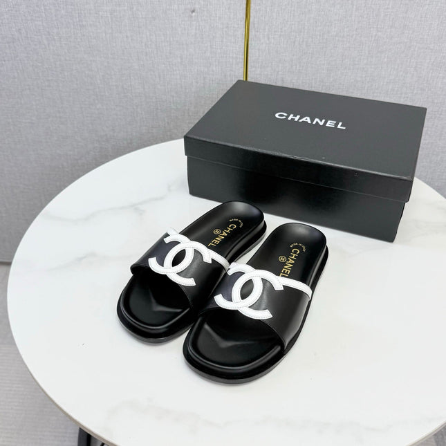 CHANEL 26S ICONIC CC SLIDES IN BLACK LAMBSKIN