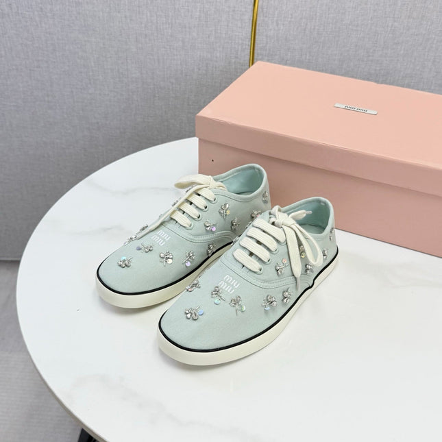 MIUMIU 26S EMBELLISHED SNEAKERS IN LIGHT BLUE FABRIC