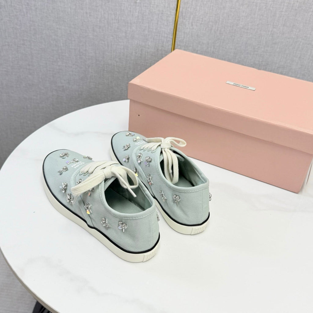 MIUMIU 26S EMBELLISHED SNEAKERS IN LIGHT BLUE FABRIC