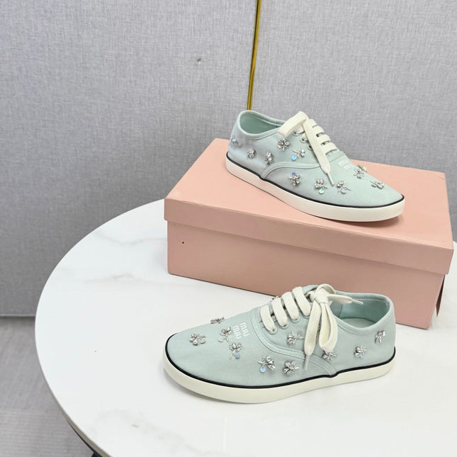 MIUMIU 26S EMBELLISHED SNEAKERS IN LIGHT BLUE FABRIC