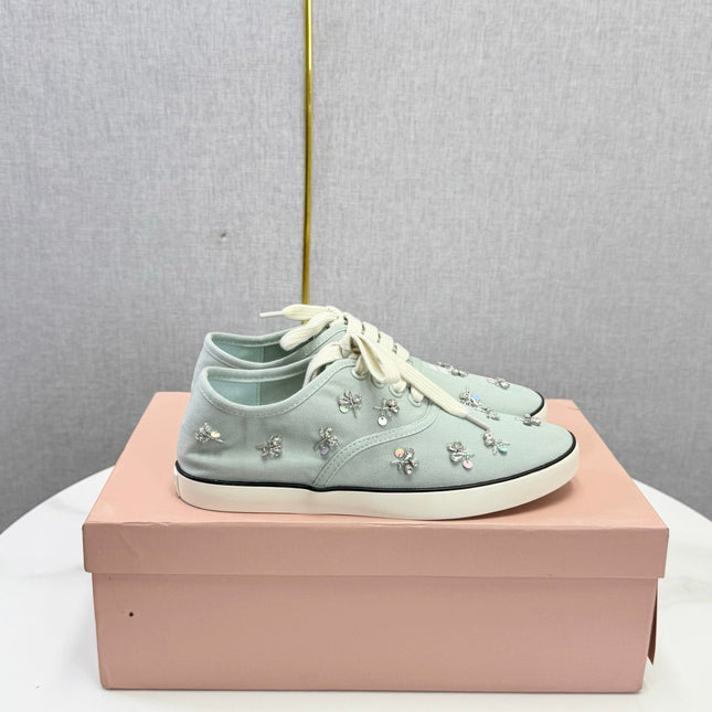 MIUMIU 26S EMBELLISHED SNEAKERS IN LIGHT BLUE FABRIC