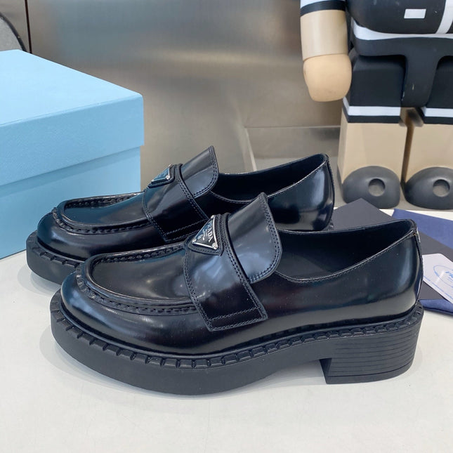 PRADA 26S LOAFERS IN BLACK CALFSKIN WITH LOGO SILVER HARDWARE