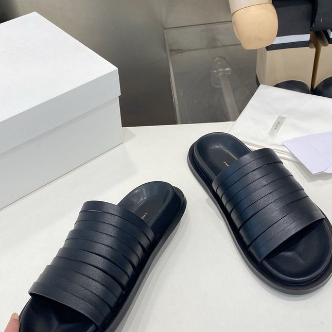 THE ROW 26S MULTI STRAP SLIDES IN BLACK CALFSKIN