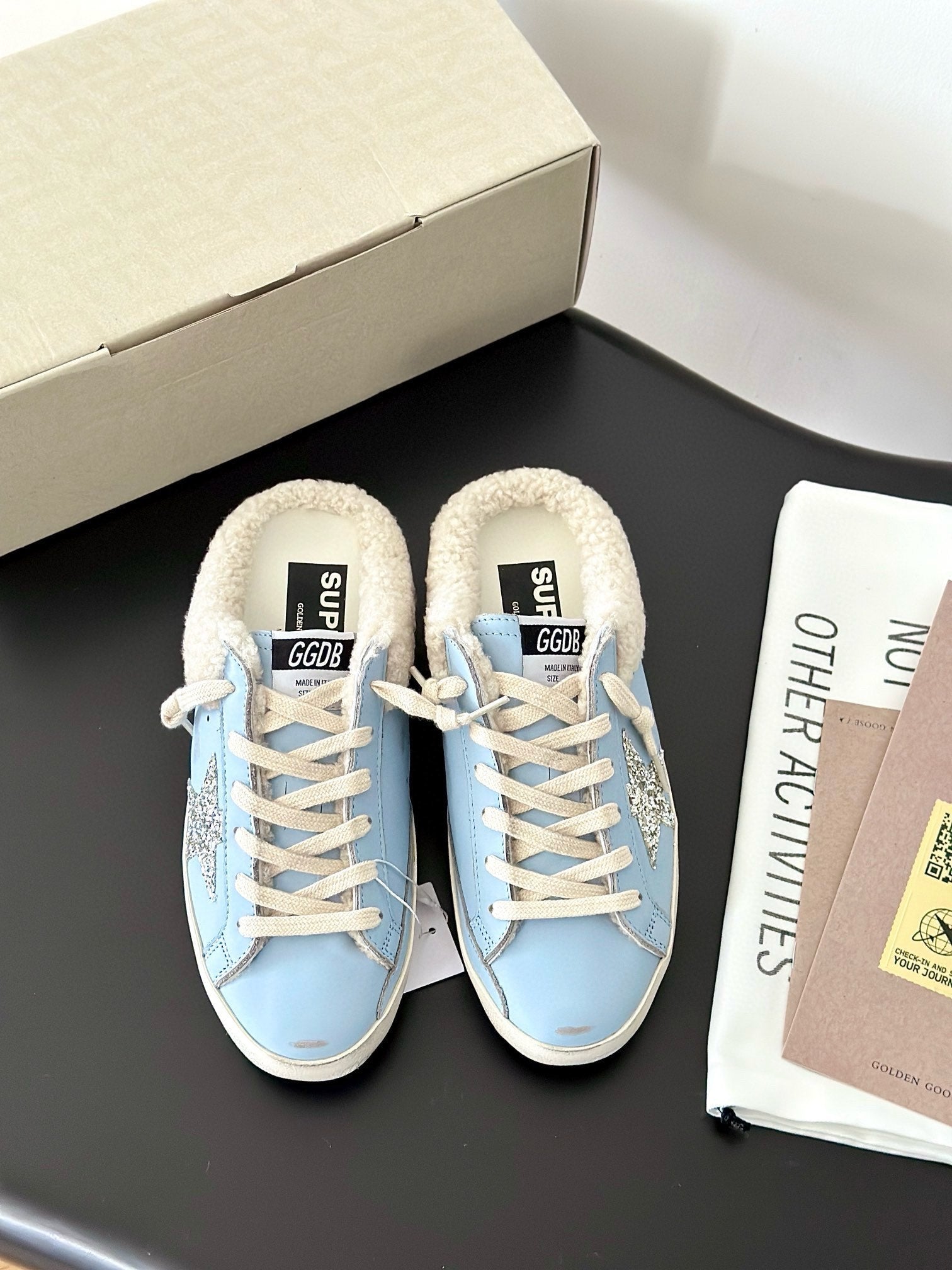 SUPER-STAR SABOTS IN BLUE CALFSKIN WITH GLITTER WHITE STAR