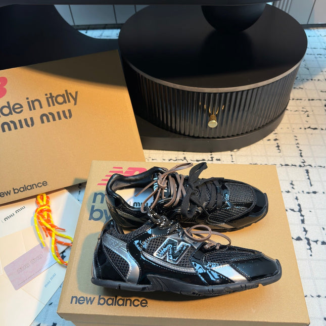 MIUMIU 26S RUNNING SNEAKERS IN BLACK CALFSKIN AND MESH RUBBER SOLE
