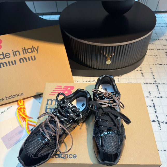 MIUMIU 26S RUNNING SNEAKERS IN BLACK CALFSKIN AND MESH RUBBER SOLE