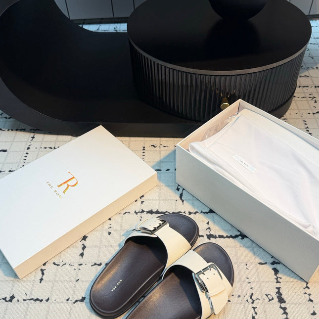THE ROW 26S BUCKLE SLIDE SANDALS IN WHITE CALFSKIN