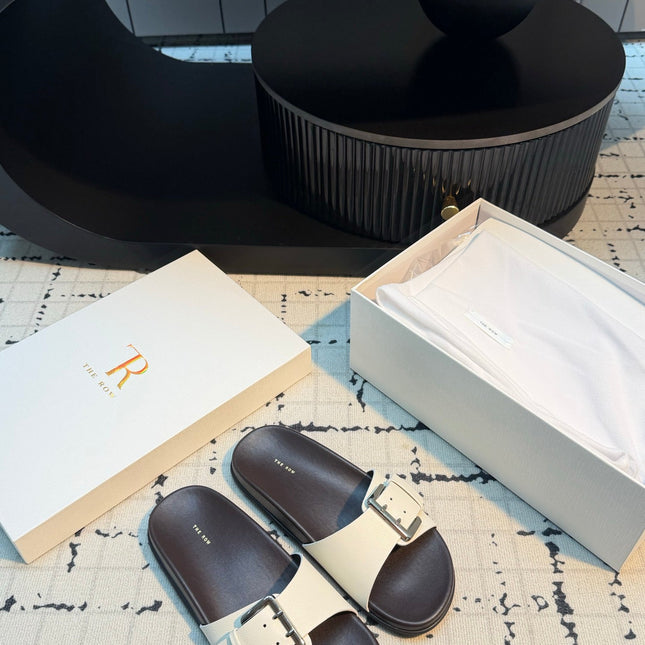 THE ROW 26S BUCKLE SLIDE SANDALS IN WHITE CALFSKIN