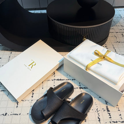 THE ROW 26S THONG SLIDE SANDALS IN BLACK CALFSKIN