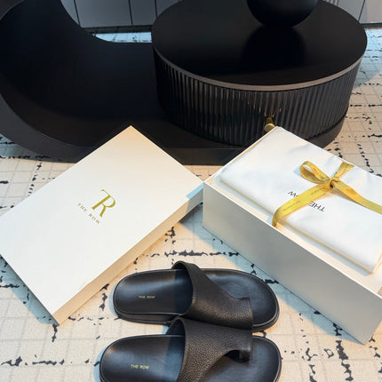 THE ROW 26S THONG SLIDE SANDALS IN BLACK CALFSKIN