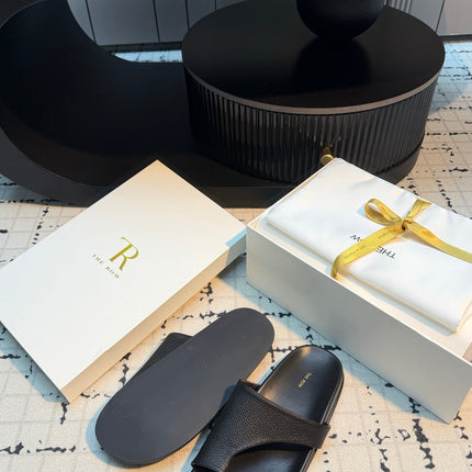 THE ROW 26S THONG SLIDE SANDALS IN BLACK CALFSKIN