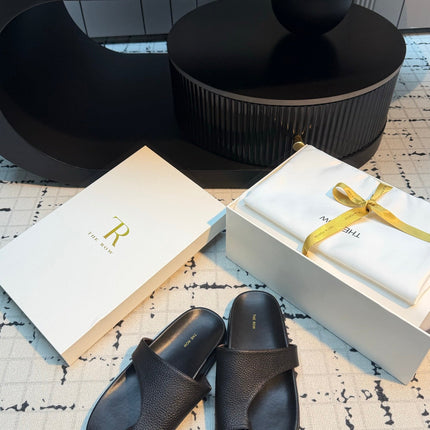 THE ROW 26S THONG SLIDE SANDALS IN BLACK CALFSKIN