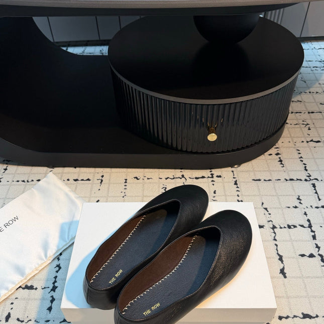 THE ROW 26S CLASSIC BALLET FLATS IN BLACK CALFSKIN