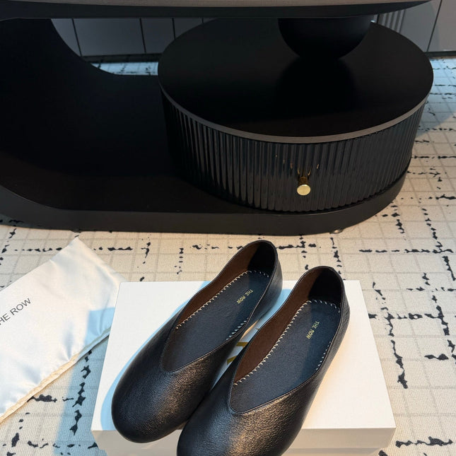 THE ROW 26S CLASSIC BALLET FLATS IN BLACK CALFSKIN