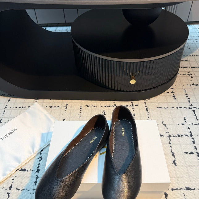 THE ROW 26S CLASSIC BALLET FLATS IN BLACK CALFSKIN