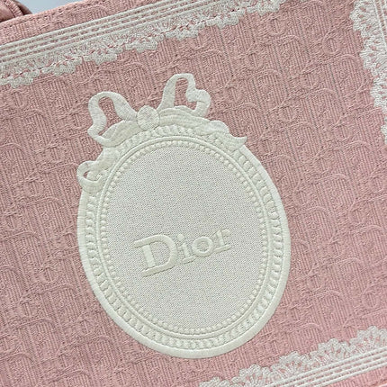 DIOR 26S  BOOK TOTE BAG 36 IN LIGHT PINK AND WHITE FABRIC