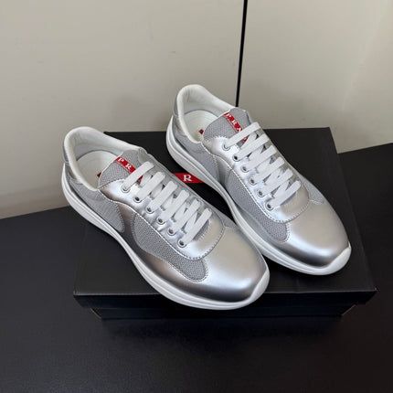 PRADA 26S SNEAKERS IN SILVER CALFSKIN AND WHITE MESH